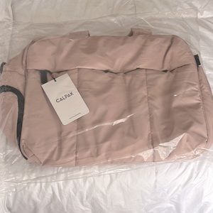 New Calpak Rose Quartz Luka Duffel Bag